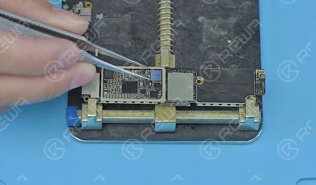 Apply some BGA paste flux to the bonding pad. Then align the audio IC to the right place and blow it with a hot air gun at 280 degrees.