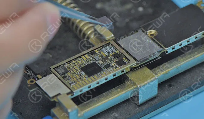 Apply some BGA paste flux around the audio IC and blow it with hot air gun at 300 degrees. Then take down the audio IC.