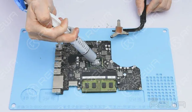 Apply some thermal paste and install heat sink.
