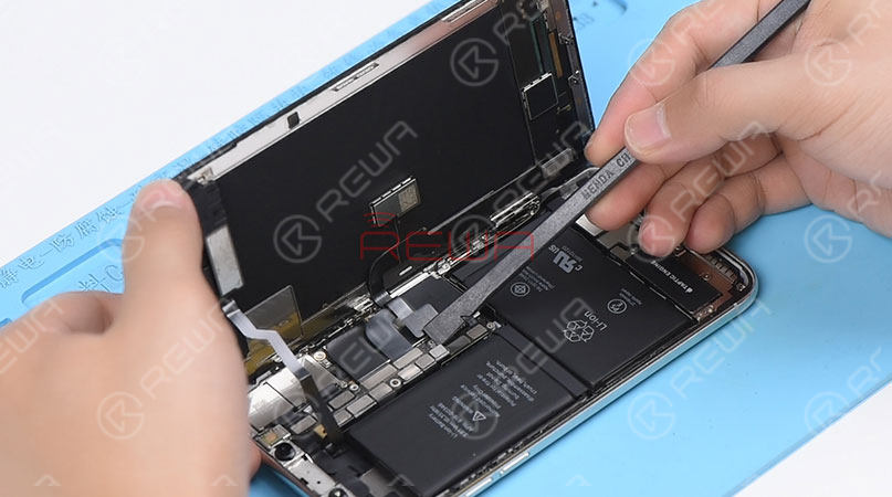 Pry the digitizer cable connector up from its socket And then disconnect the front panel sensor assembly flex cable 