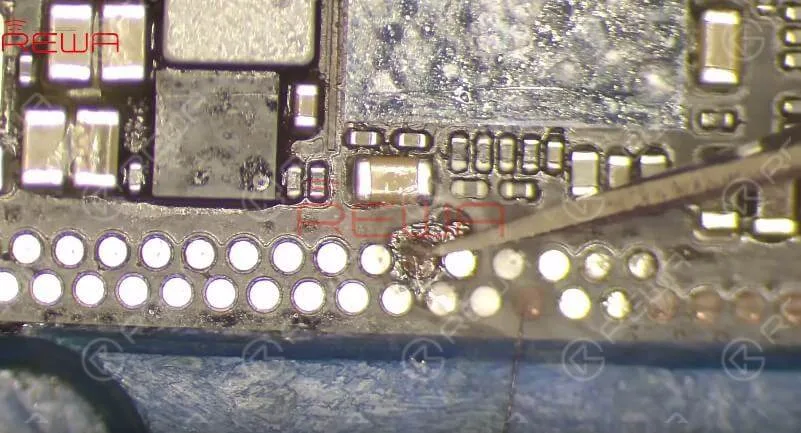 iphone x bottom speaker not working repair Since most of those missing pads are ground pads, we can just ignore them. Still, we need to treat Pin S166 with jumper wiring before soldering. Once done, get the lower layer reballed and re-solder the motherboard.