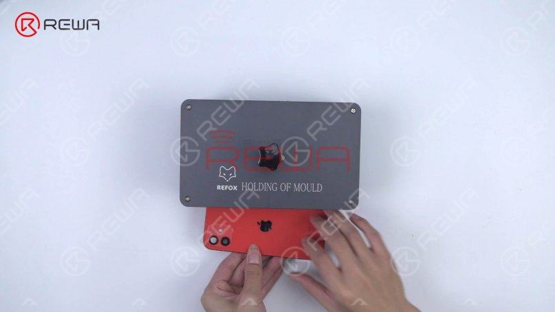 Press the back glass further against the middle frame with Press Clamp.