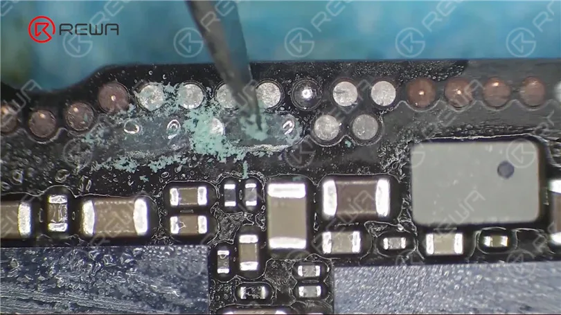 fixing iphone x unable to activate by jumping wires Scrape away excess solder mask with Sculpture Knife to show the copper wires.
