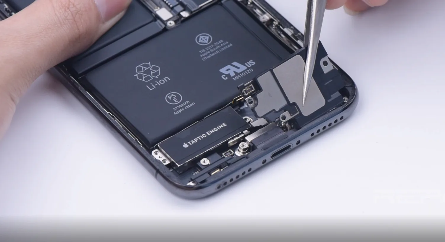 Detach the earpiece speaker flex cable