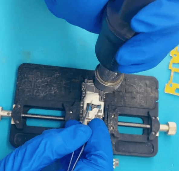 19 Solder back the shielding cover