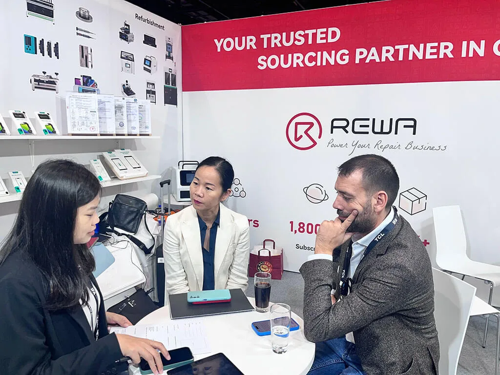 rewa tech showcases its latest innovations at ifa berlin 2025 — shaping the future of repair businesses REWA Team Engaging with Visitors