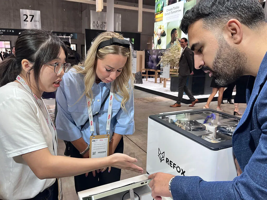 rewa tech showcases its latest innovations at ifa berlin 2025 — shaping the future of repair businesses REWA Team Engaging with Visitors