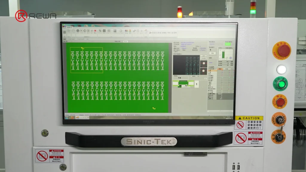 A Sinic-Tek 3D SPI machine monitor displaying a panel inspection layout for solder paste quality control