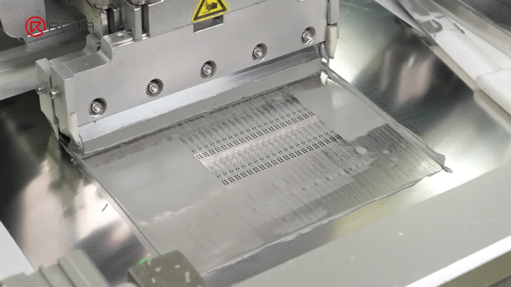 Automated SMT squeegee applying gray solder paste over a stencil onto a BMS circuit board